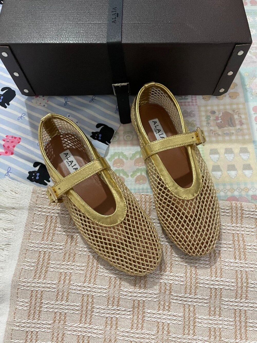 ALAÏA Gold Mesh Mary Jane Flats